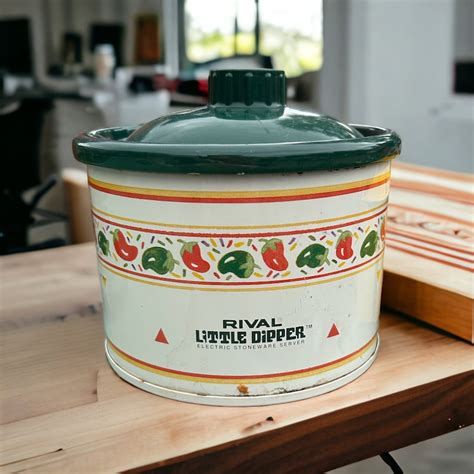 It doesnt get any cuter than this vintage 1980s Rival Crock-Ette electric crock pot / slow cooker! The perfect tool for serving hot grub to your guests, ... Vintage 1980s Rival 1 Qt. Crock-Ette Crock Pot with Lid Model #3205, Electric Stoneware Slow Cooker, White with Blue Flowers. Sold
